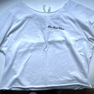 Rue21 “the best vibes” white cropped tee, tie up back. Used, in good condition